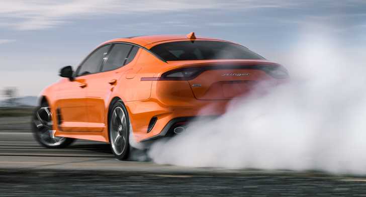 Kia’s Very Orange Stinger GTS Adds All-Wheel Drive, Carbon Bits